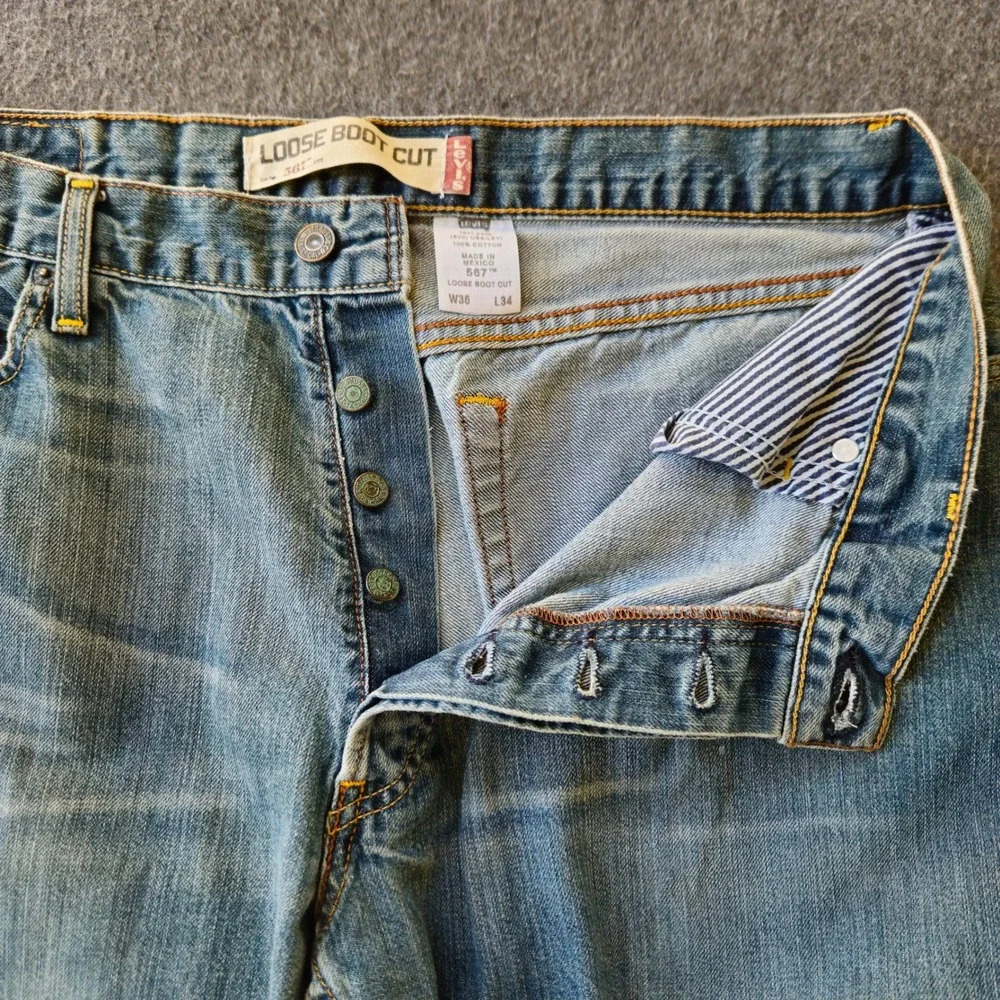 Vintage Levi's 567 Loose Boot Cut Jeans Button Fly Raw Hem Label 36x34 Act 34x31